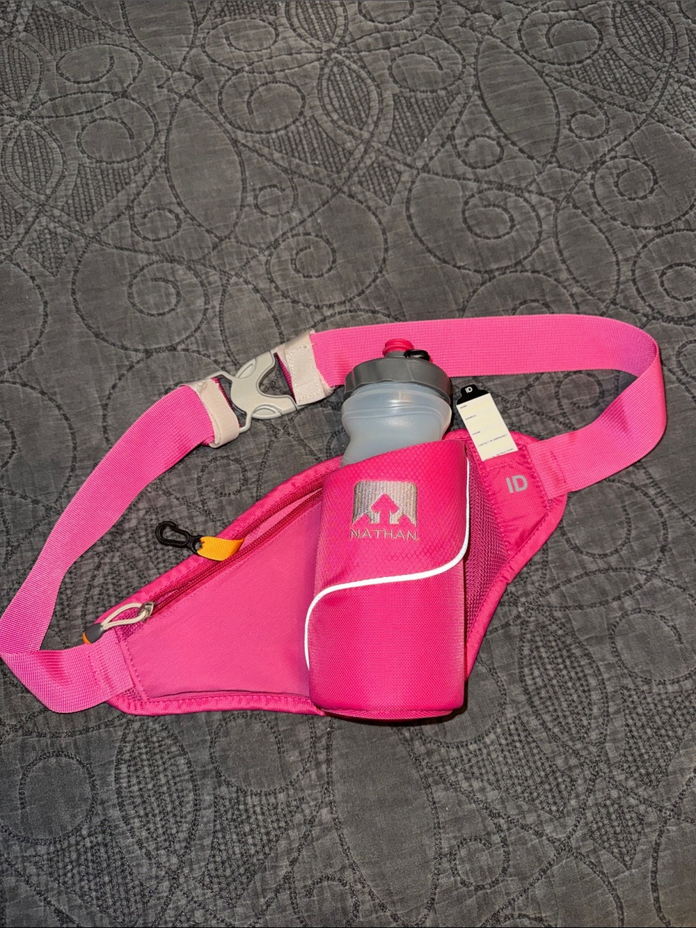 Nathan water belt bag with water bottle.